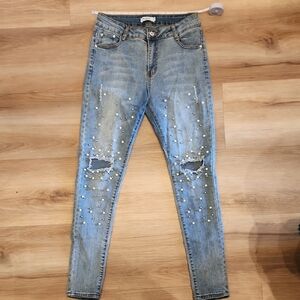 Women's Blue Distressed Jeans with Pearl Accents